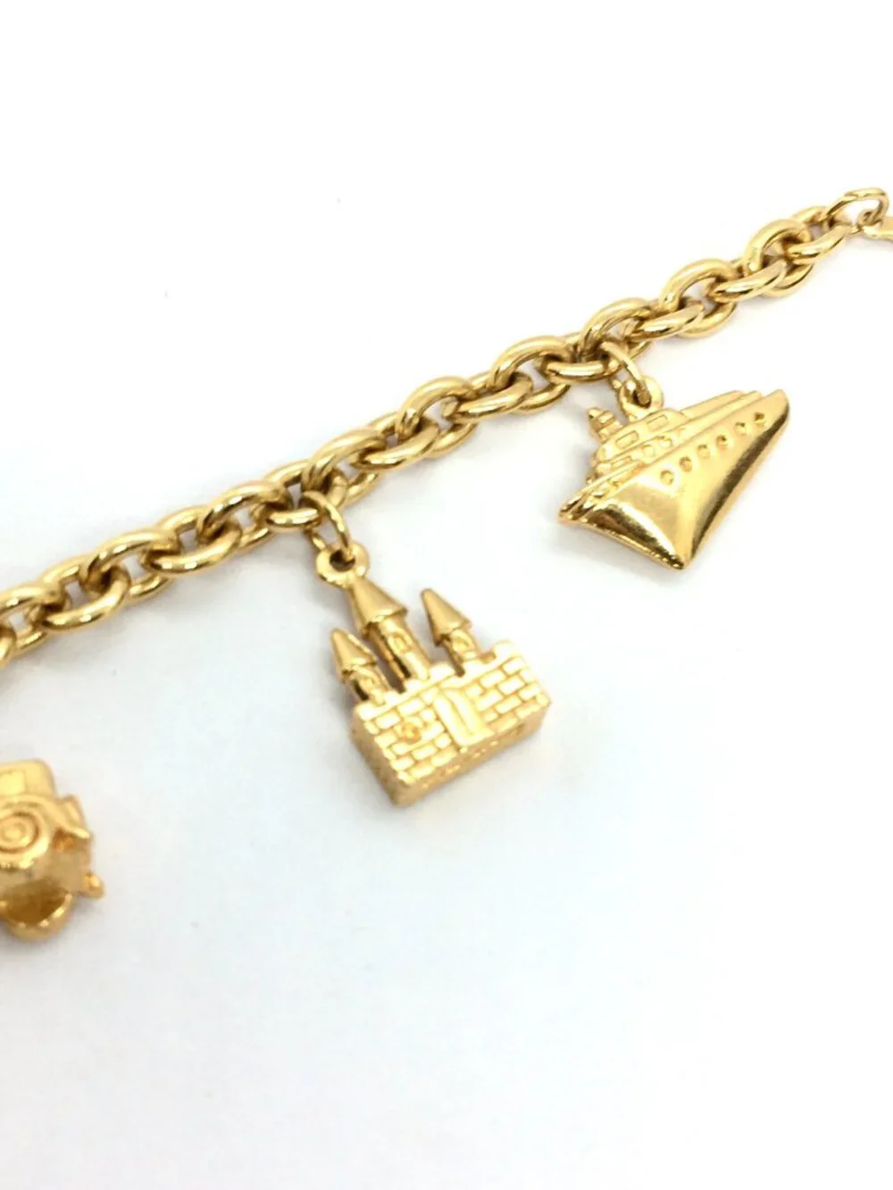 VINTAGE AVON BRACELET Rich & Famous Gold Tone 5 Charm Travel Theme 1980s - Picture 7 of 12